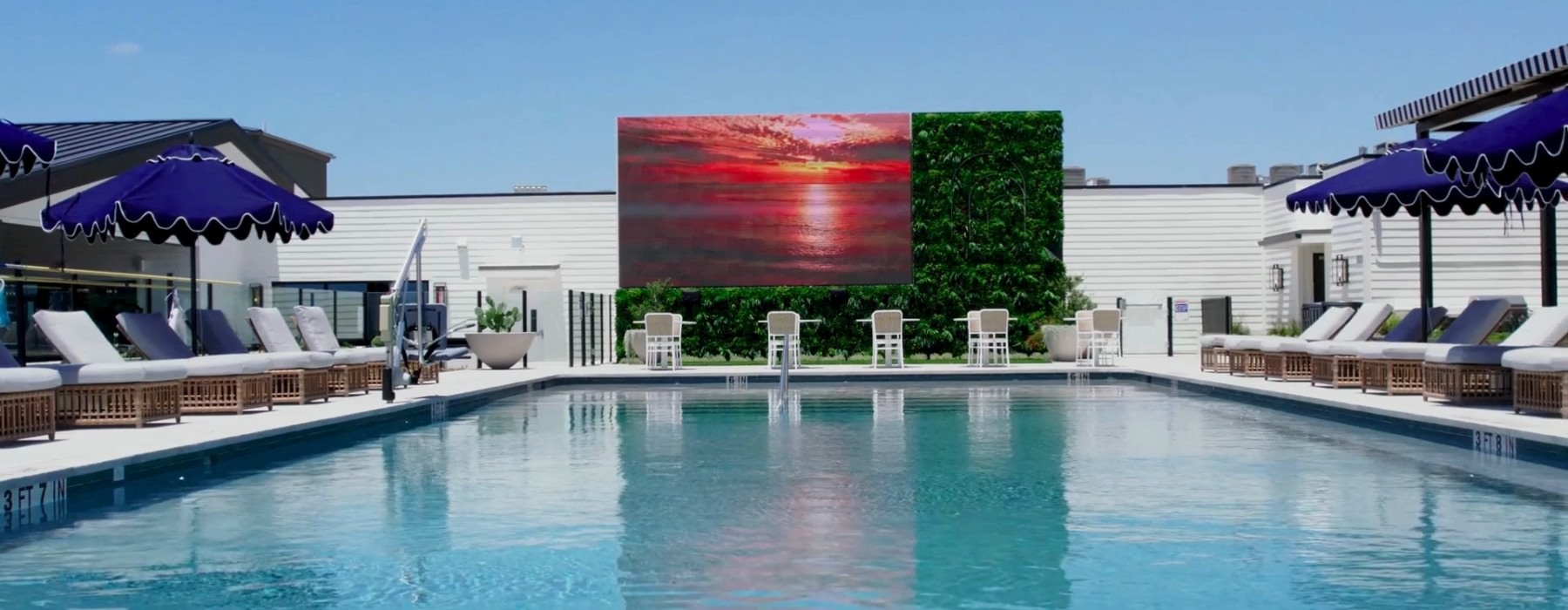 a pool in front of a building